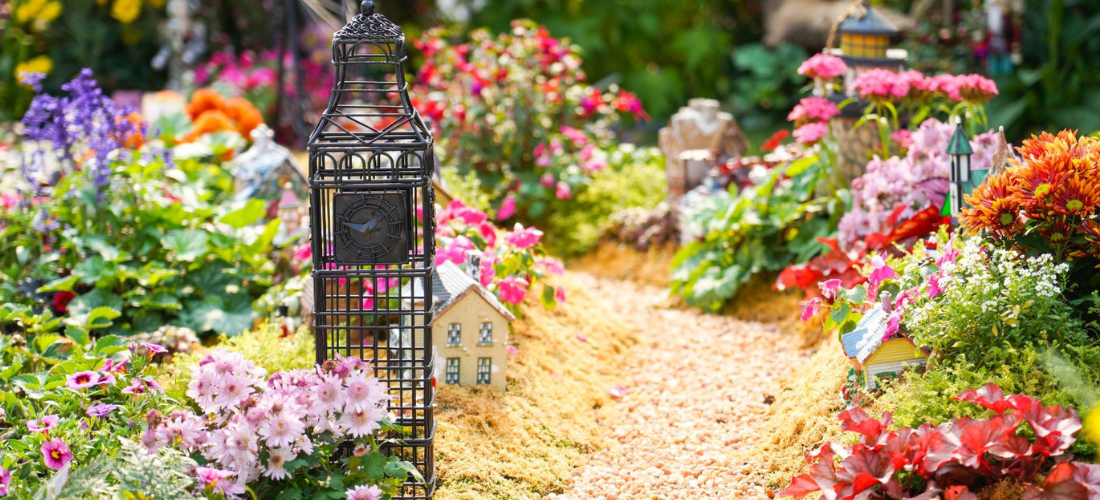 A pretty garden path surrounded by flowers