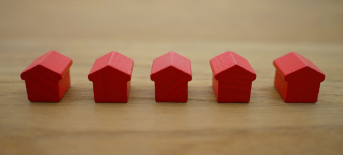 Red houses lined up in a row