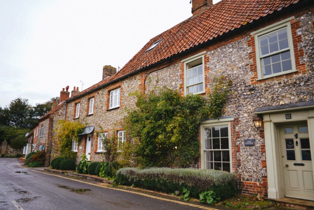 Old house with ivy growing around the windows
