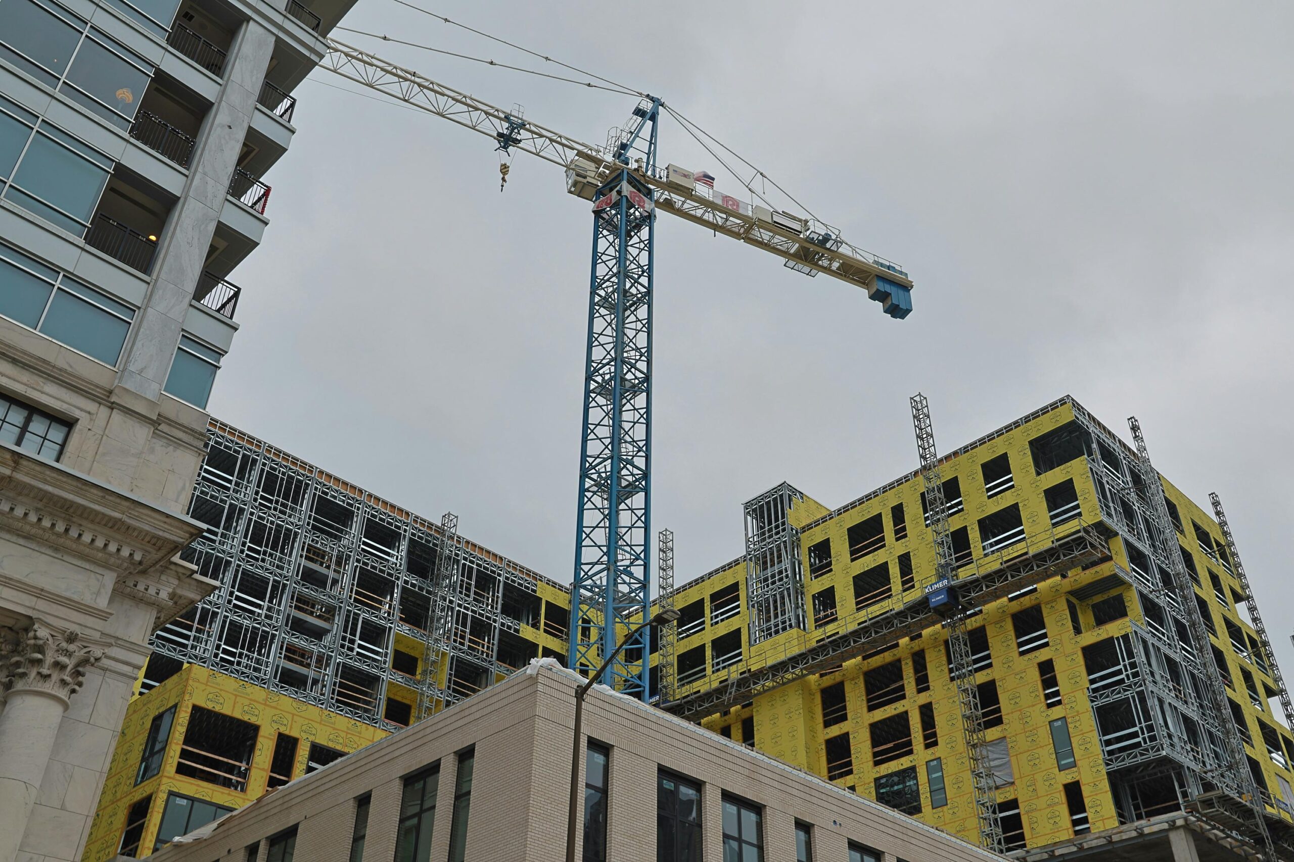 A crane being used to build a large commercial building